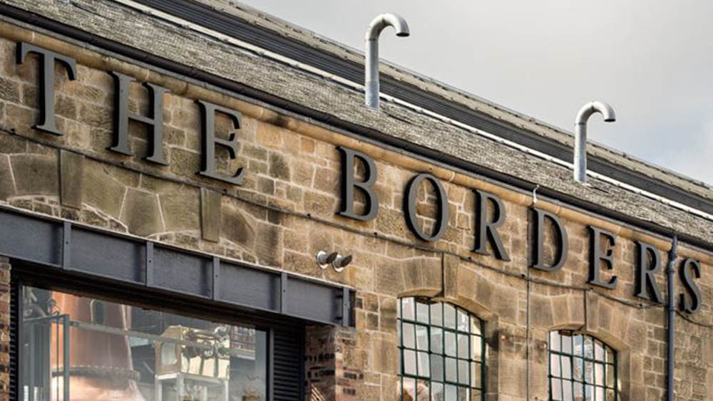 Sign saying The Borders the distillery in Scotland