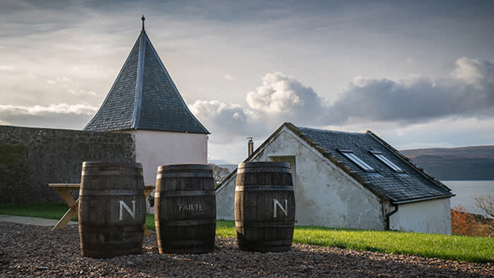 Whisky barrels outside Nc'nean distillery