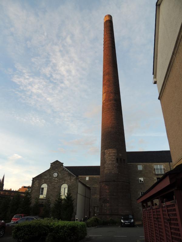 The tall Victorian chimney at what is left of Caledonian distillery.