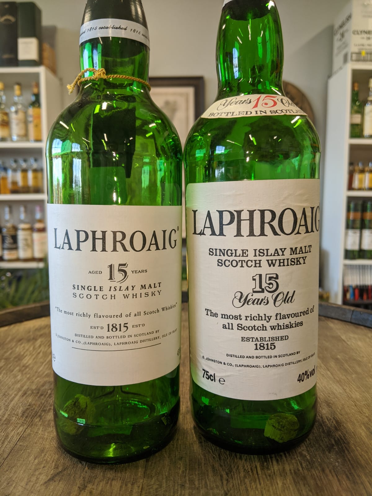 Laphroaig bottles 2 Two bottles of Laphroaig, both from the 1990s.