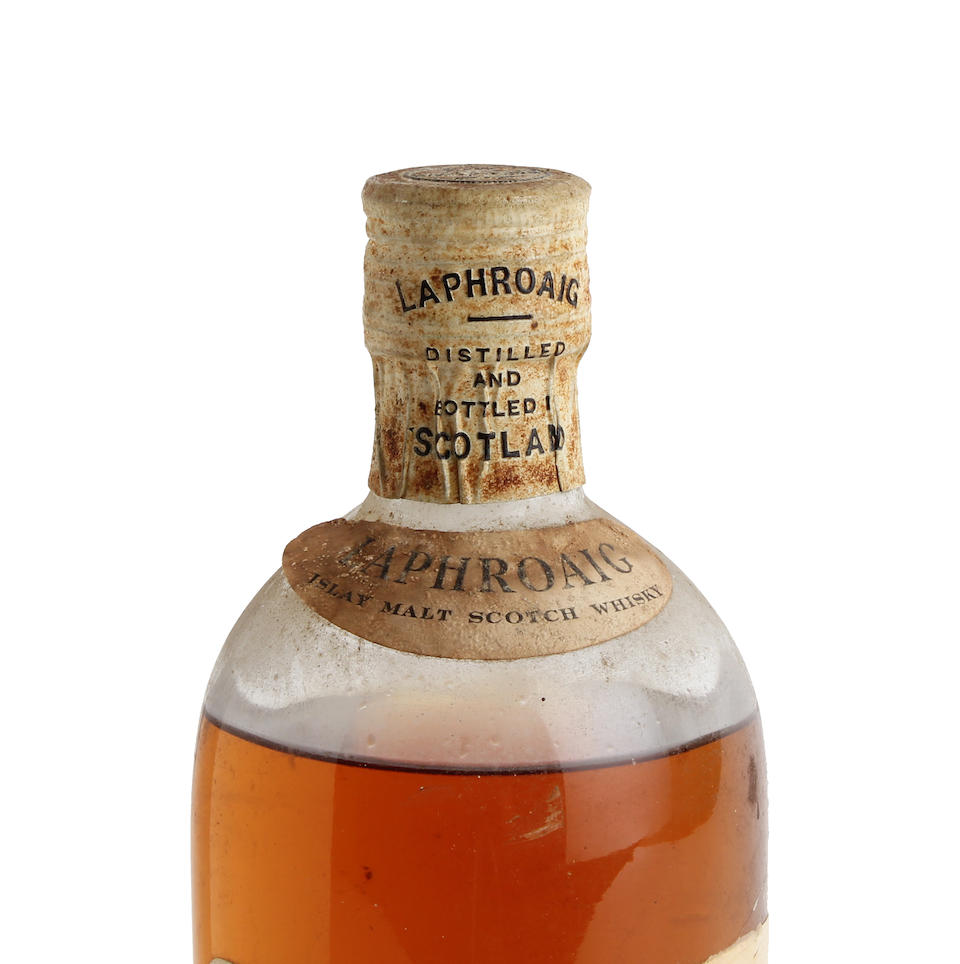laphroaig 10yo via bonhams 2 This in an example of a short screw cap from the 1960s. Image via Bonhams.