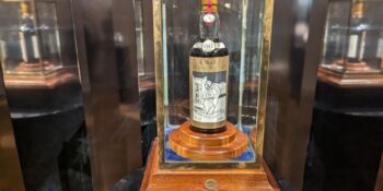 Macallan 1926, Valerio Adami, whisky auction, world record sale, luxury whisky, Scotch whisky, rare collectibles, whisky investment, auction news, Macallan collection, whisky aficionado, high-end spirits, Macallan mastery, historic whisky, record-breaking sale, Adami edition, fine spirits, whisky market, premium Scotch