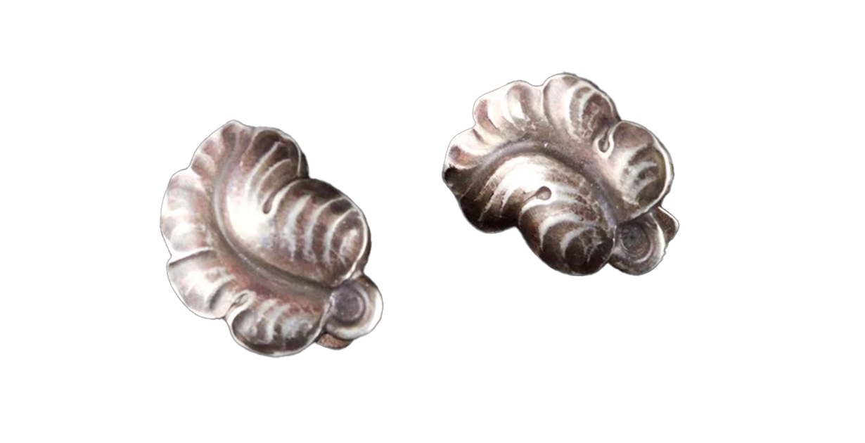 Georg-Jensen-Jewellery-Leaf-Earrings These leaf pattern earrings are indicative of Jensen's Art Nouveau influences.