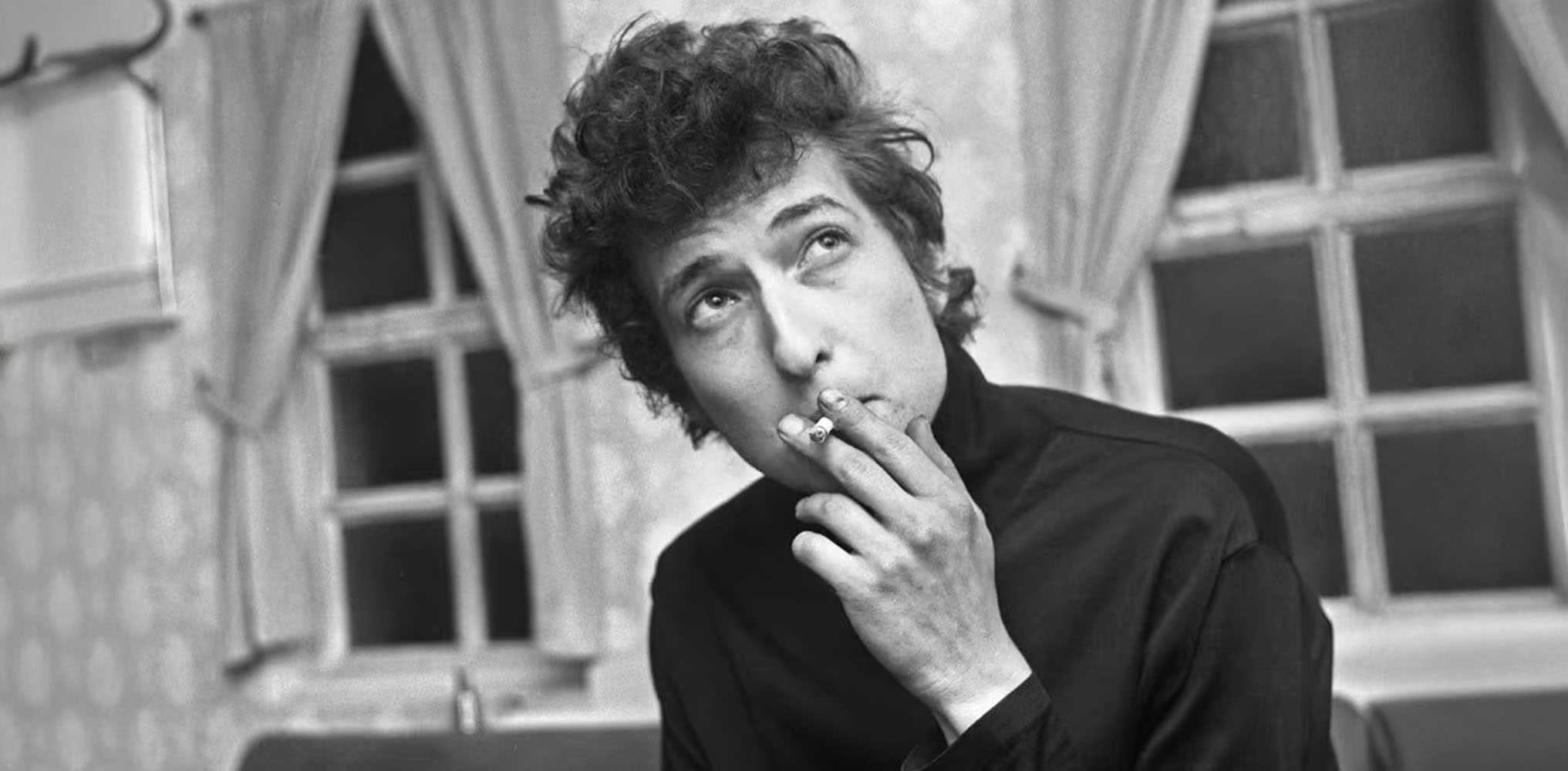 Bob Dylan 4 Legendary musician and artist, Bob Dylan, backstage with his customary cigarette at the Montfort Hall in Leicester, 1965.
