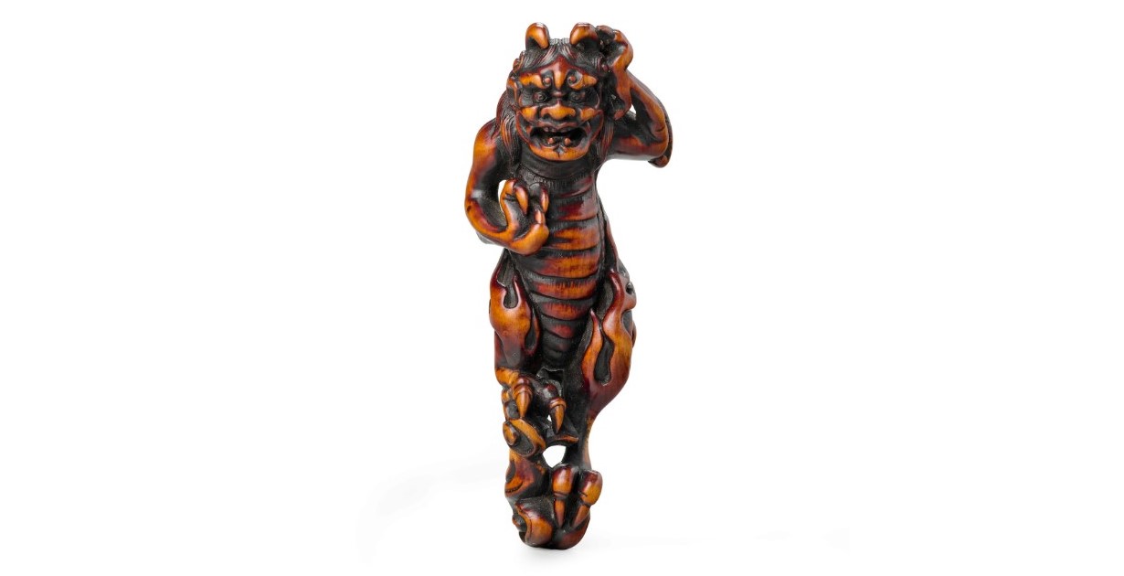 A RARE WOOD NETSUKE OF A KIRIN ON A CLOUD